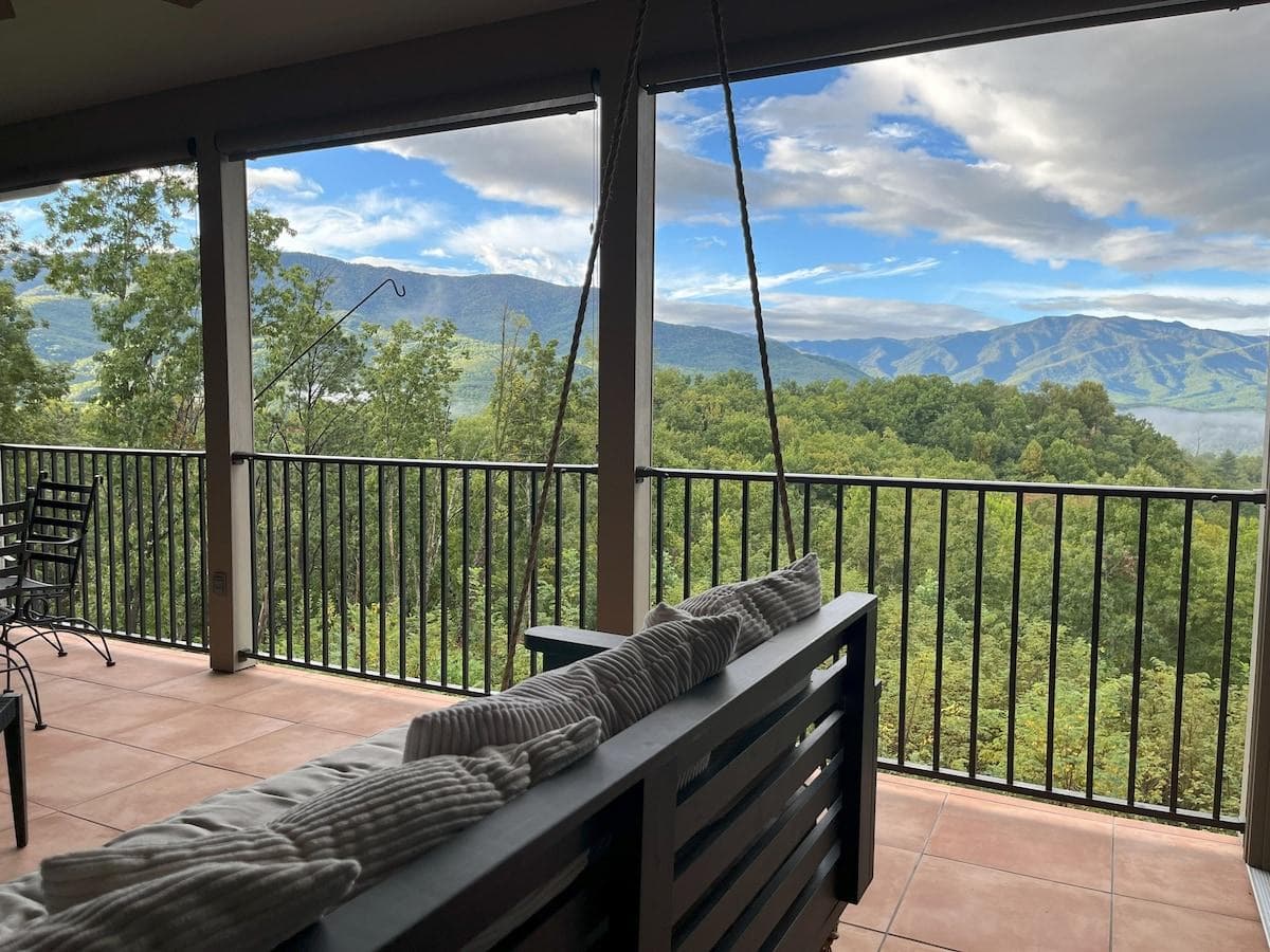Look at those panoramic mountain views from the 2nd story open air porch.  Swing on the bed or rock on the rocking chairs while watching the humming birds come to the feeders and the smoky mountain views as far as the eye can see!
