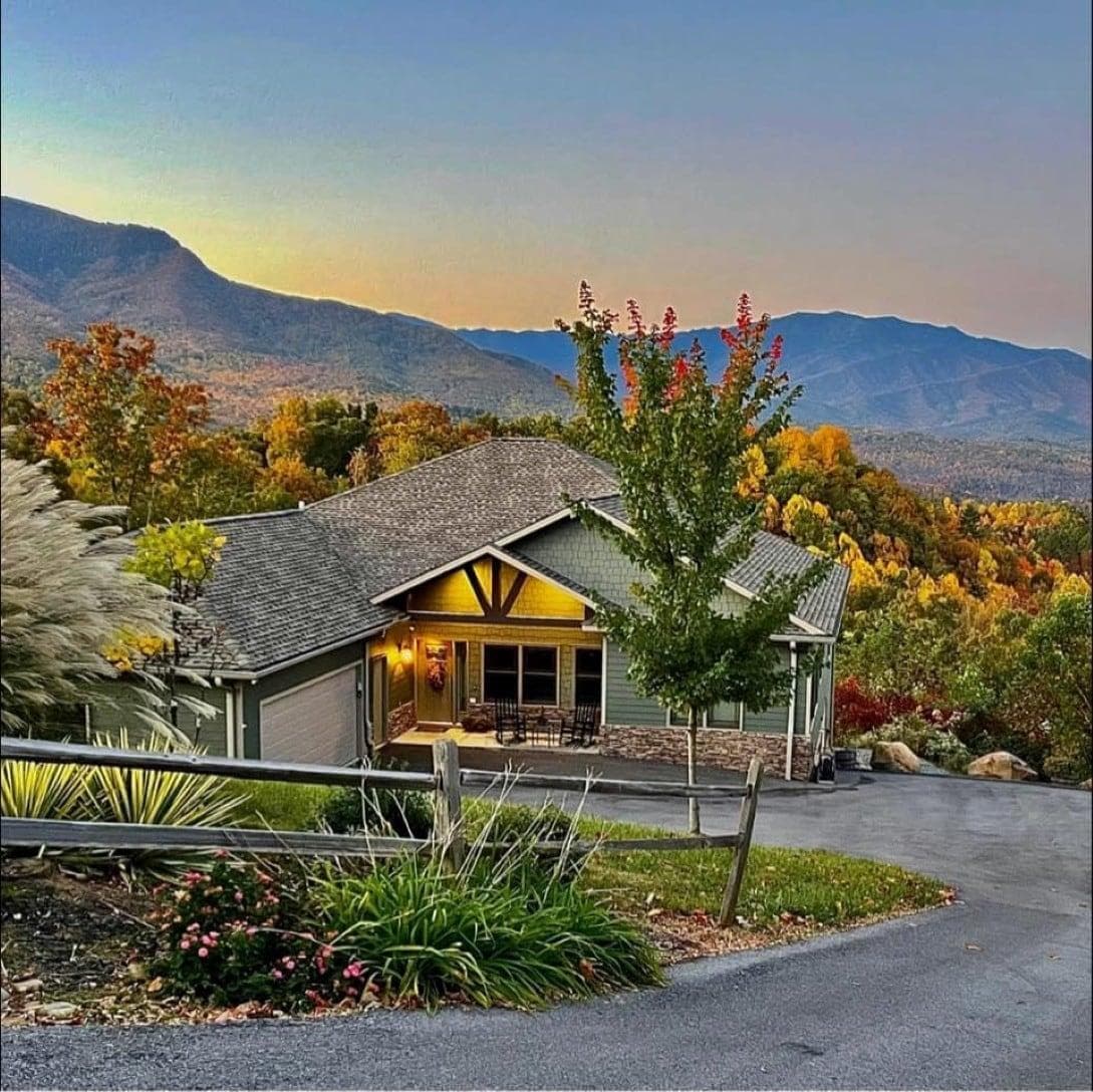 Peace and Quiet mountain home is a 6 bedroom 4 bathroom handicap accessible luxury rental with panoramic mountain views.  Amenities include: 3 porches, one screened, hot tub, 3 neighborhood pools and level parking for 4 cars outside and 2 in garage.